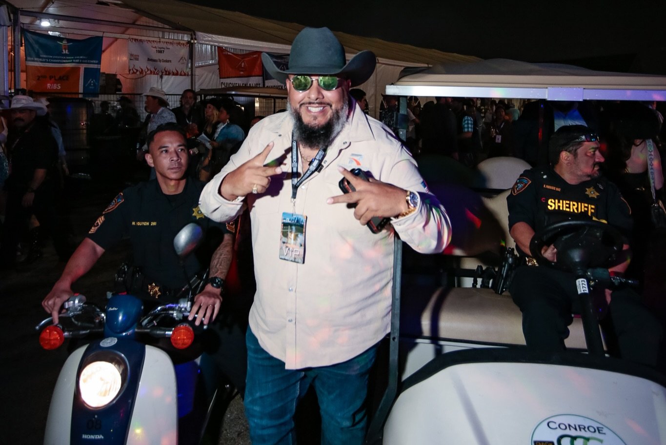 Roman Torres backstage at a Texas event