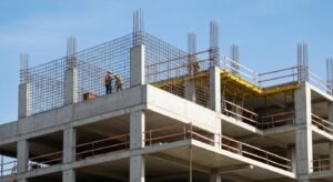 Construction site featuring durable materials like concrete and steel, highlighting innovative building solutions